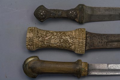 Lot 558 - A PERSIAN DAGGER (JAMBIYA) AND TWO FURTHER DAGGERS (JAMBIYA), LATE 19TH/20TH CENTURY