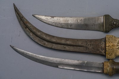 Lot 558 - A PERSIAN DAGGER (JAMBIYA) AND TWO FURTHER DAGGERS (JAMBIYA), LATE 19TH/20TH CENTURY