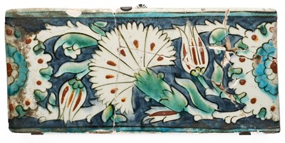 Lot 247 - AN IZNIK BORDER TILE, OTTOMAN ANATOLIA, 17TH CENTURY