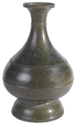 Lot 388 - A KHMER BRONZE BOTTLE, CAMBODIA, CIRCA 12TH CENTURY