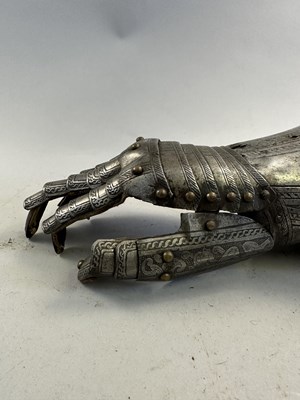 Lot 170 - A COMPOSITE NORTH ITALIAN CAP-A-PIE ARMOUR WITH ETCHED DECORATION, LATE 16TH CENTURY, THE BACKPLATE SIGNED BY THE MASTER ‘P’
