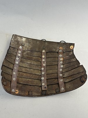 Lot 170 - A COMPOSITE NORTH ITALIAN CAP-A-PIE ARMOUR WITH ETCHED DECORATION, LATE 16TH CENTURY, THE BACKPLATE SIGNED BY THE MASTER ‘P’