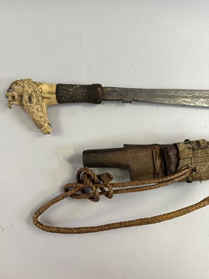 Lot 562 - A DYAK SWORD (MANDAU), BORNEO, LATE 19TH CENTURY