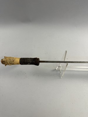 Lot 562 - A DYAK SWORD (MANDAU), BORNEO, LATE 19TH CENTURY