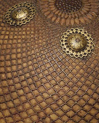 Lot 74 - A FINE SOUTH INDIAN TRANSLUCENT HIDE SHIELD (DHAL), 18TH CENTURY, PROBABLY HYDERABAD