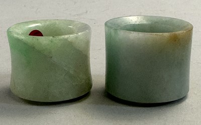 Lot 521 - □ TWO CHINESE JADEITE ARCHERS RINGS, QING DYNASTY, 19TH CENTURY