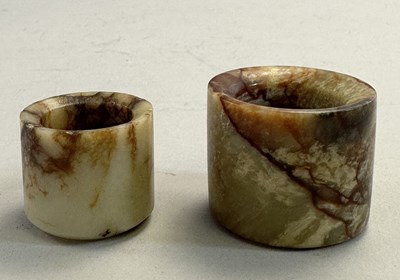 Lot 519 - □ TWO CHINESE JADE ARCHERS RINGS, QING DYNASTY, 19TH CENTURY