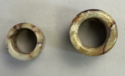 Lot 519 - □ TWO CHINESE JADE ARCHERS RINGS, QING DYNASTY, 19TH CENTURY