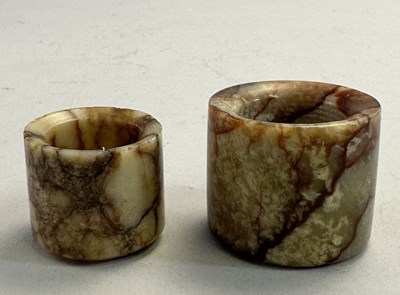 Lot 519 - □ TWO CHINESE JADE ARCHERS RINGS, QING DYNASTY, 19TH CENTURY