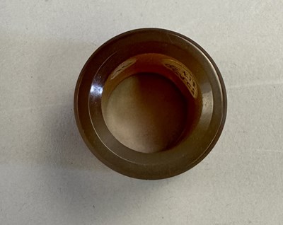 Lot 507 - □ A CHINESE AGATE ARCHERS RING, QING DYNASTY, 19TH CENTURY