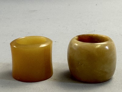 Lot 511 - □ TWO CHINESE JADE ARCHERS RINGS, QING DYNASTY, 19TH CENTURY