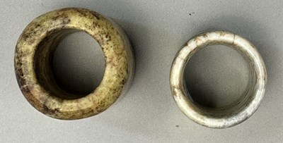 Lot 512 - □ TWO CHINESE JADE ARCHERS RINGS, QING DYNASTY, 19TH CENTURY