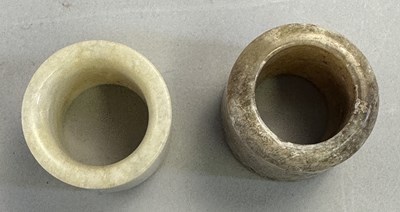 Lot 513 - □ TWO CHINESE JADE ARCHERS RINGS, QING DYNASTY, 19TH CENTURY