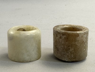 Lot 513 - □ TWO CHINESE JADE ARCHERS RINGS, QING DYNASTY, 19TH CENTURY