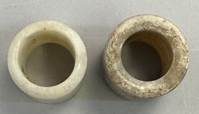 Lot 513 - □ TWO CHINESE JADE ARCHERS RINGS, QING DYNASTY, 19TH CENTURY
