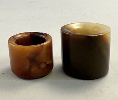 Lot 510 - □ TWO CHINESE JADE ARCHERS RINGS, QING DYNASTY, 19TH CENTURY