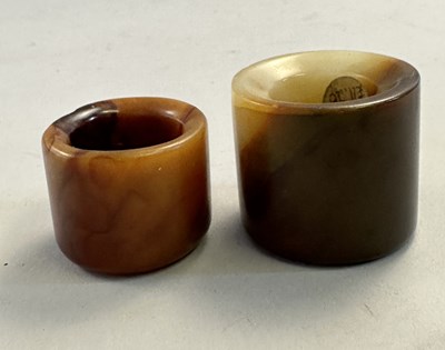 Lot 510 - □ TWO CHINESE JADE ARCHERS RINGS, QING DYNASTY, 19TH CENTURY