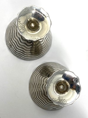 Lot 48 - A SET OF SIX SILVER ZARFS, OTTOMAN EMPIRE OR SUCCESSOR STATES, EARLY 20TH CENTURY