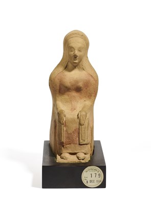 Lot 4 - A FIGURE OF A SEATED WOMAN, PROBABLY RHODES, LATE 6TH CENTURY B.C.