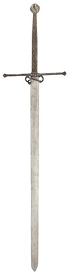 Lot 122 - A COMPOSITE GERMAN TWO HAND SWORD, THE BLADE EARLY 16TH CENTURY, THE HILT PARTLY 16TH CENTURY