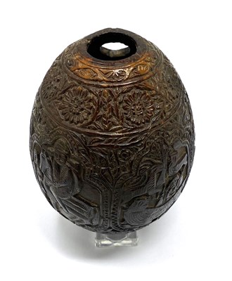 Lot 80 - A CARVED COCONUT HUQQA BASE, INDO-PERSIAN, 19TH CENTURY