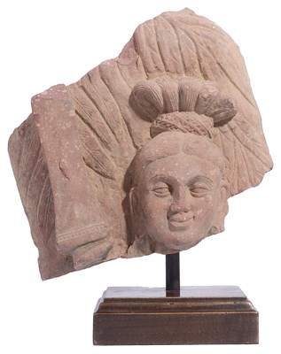 Lot 165 - A KUSHAN MOTTLED PINK SANDSTONE RELIEF FRAGMENT, MATHURA, INDIA, 2ND/3RD CENTURY A.D.