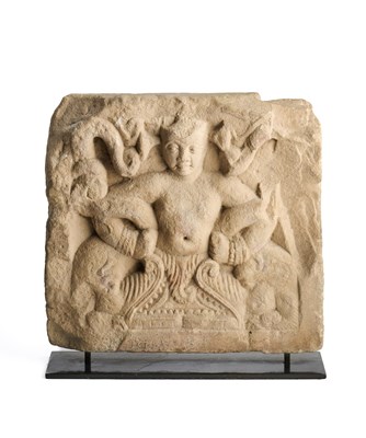 Lot 166 - A KUSHAN PANEL DEPICTING A TRITON WITH A PAIR OF MAKARAS, MATHURA, INDIA, 1ST-2ND CENTURY