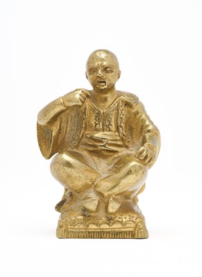 Lot 99 - A CHINESE GILT-BRONZE FIGURE OF A LUOHAN, QING DYNASTY, 18TH CENTURY