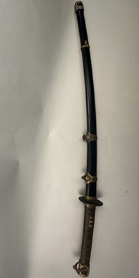 Lot 90 - A JAPANESE NAVAL OFFICERS SWORD (KAI GUNTO), SHOWA PERIOD (1930-1945)