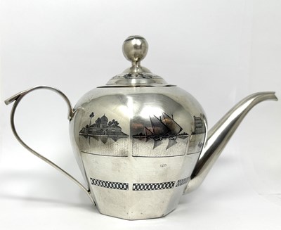 Lot 41 - AN IRAQI SILVER AND NIELLO THREE-PIECE TEA SET, PROBABLY BAGHDAD OR OMARA, CIRCA 1930