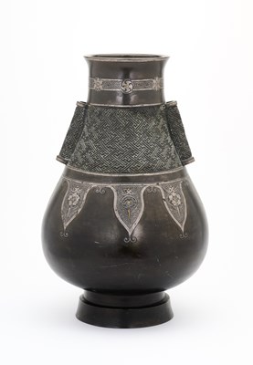 Lot 97 - A CHINESE ARCHAISTIC GOLD AND SILVER-INLAID BRONZE VASE, HU, QING DYNASTY, 19TH CENTURY