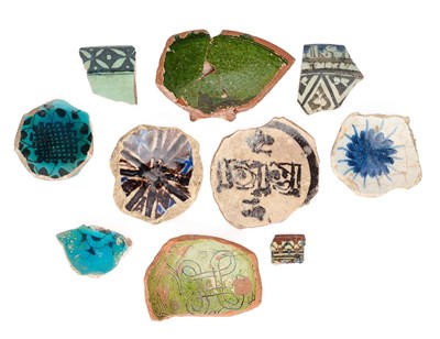 Lot 167 - A COLLECTION OF EARLY ISLAMIC POTTERY SHARDS, 11TH-14TH CENTURIES
