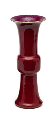 Lot 26 - A CHINESE FLAMBE-GLAZED BEAKER VASE^ GU^ QING...