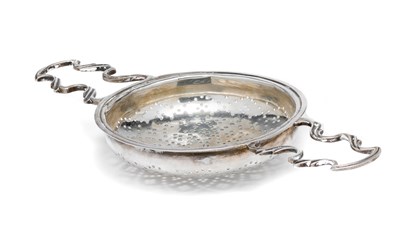 Lot 393 - A GEORGE III SILVER LEMON STRAINER^ MAKER~S...