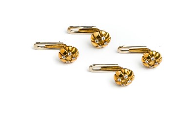 Lot 456 - GOLD AND DIAMOND DRESS STUDS¦each stylised...