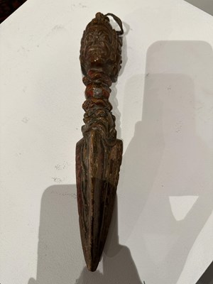 Lot 408 - A CARVED AND PAINTED WOOD RITUAL DAGGER (PHURBU), TIBET, 19TH CENTURY