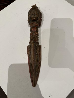 Lot 408 - A CARVED AND PAINTED WOOD RITUAL DAGGER (PHURBU), TIBET, 19TH CENTURY
