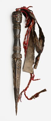 Lot 405 - TWO CARVED WOOD BUDDHIST RITUAL DAGGERS (PHURBU), NEPAL, CIRCA 19TH CENTURY