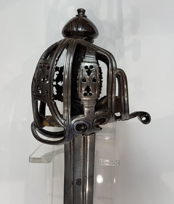 Lot 123 - A FINE AND RARE SCOTTISH BROADSWORD WITH SIGNED BASKET-HILT BY JOHN SIMPSON, GLASGOW, CIRCA 1700-10
