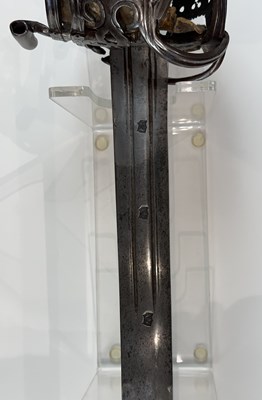 Lot 123 - A FINE AND RARE SCOTTISH BROADSWORD WITH SIGNED BASKET-HILT BY JOHN SIMPSON, GLASGOW, CIRCA 1700-10