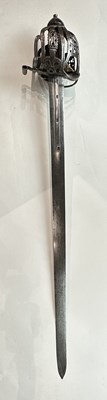 Lot 123 - A FINE AND RARE SCOTTISH BROADSWORD WITH SIGNED BASKET-HILT BY JOHN SIMPSON, GLASGOW, CIRCA 1700-10