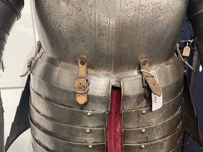 Lot 117 - A FINE AND IMPORTANT NORTH ITALIAN ENGRAVED THREE-QUARTER CUIRASSIER ARMOUR, CIRCA 1620-30