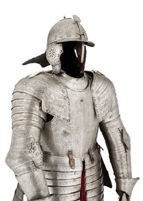 Lot 117 - A FINE AND IMPORTANT NORTH ITALIAN ENGRAVED THREE-QUARTER CUIRASSIER ARMOUR, CIRCA 1620-30