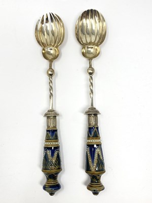 Lot 92 - A PAIR OF VICTORIAN SILVER AND STONEWARE SALAD SERVERS, 1877
