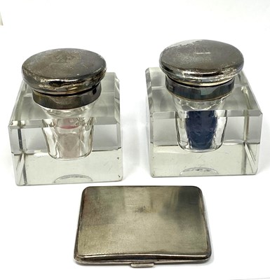 Lot 101 - A PAIR OF GEORGE V SILVER-MOUNTED GLASS INKWELLS, ASPREY & CO. LTD., LONDON, 1928 / 29
