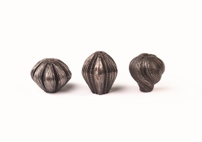 Lot 124 - THREE DETACHED GERMAN SWORD POMMELS