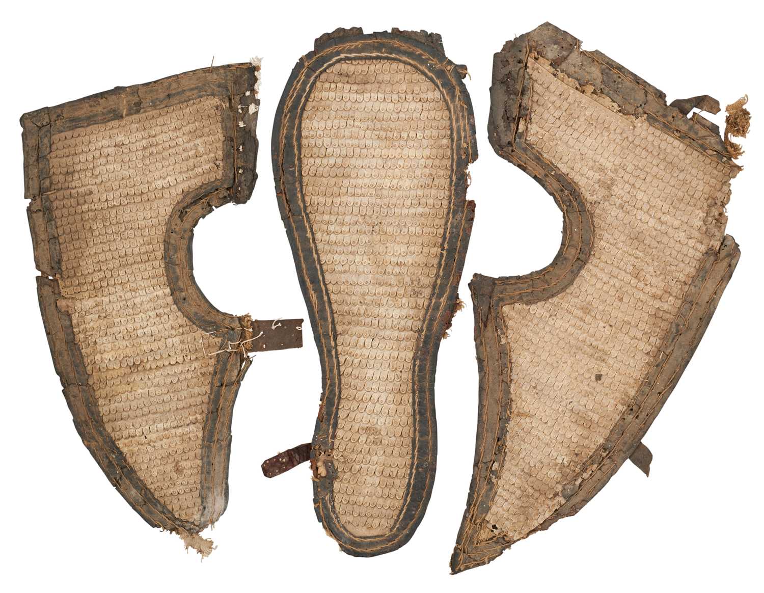 Lot 108 - A RARE INDIAN SHAFFRON OF HARDENED HIDE, 17TH/18TH CENTURY