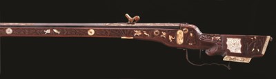 Lot 140 - A GERMAN WHEEL-LOCK SPORTING RIFLE 17TH CENTURY AND LATER with blued octagonal sighted barrel chisel