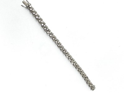 Lot 377 - GOLD AND DIAMOND BRACELET, 1974