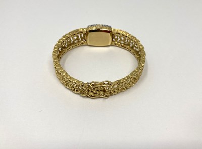 Lot 308 - OMEGA: A LADY'S GOLD AND DIAMOND BRACELET WATCH, SWISS, CIRCA 1966